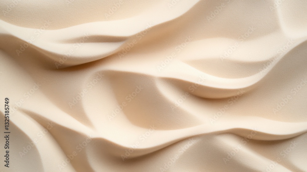 Obraz premium Soft rippling texture of desert sand creates a serene and tranquil landscape under bright sunlight