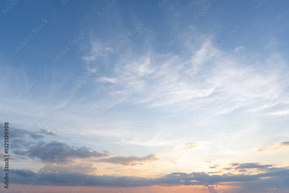 Low angle view and full frame of beautiful morning or evening blue and orange sky with cloudy while sunsets or sunrises taken at the sea used as natural background texture Low angle view and full frame of beautiful morning or evening blue and orange sky with cloudy while sunsets or sunrises taken at the sea used as natural background texture