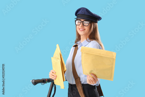 Young postwoman with letter...