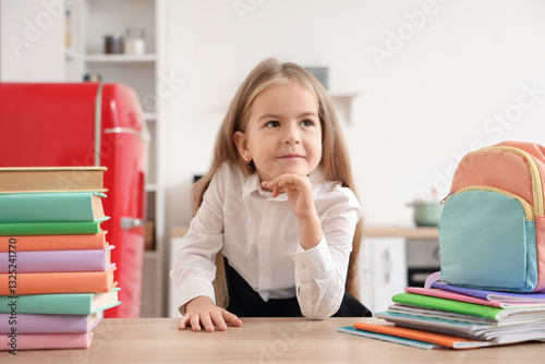 Cute little schoolgirl with...