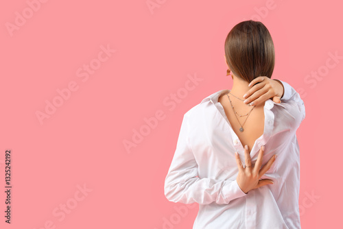 Woman with silver necklace ...