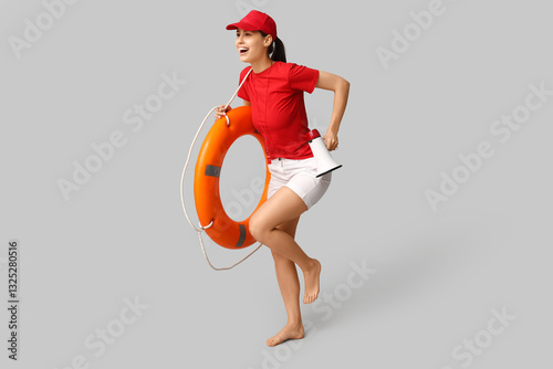 Female lifeguard with ring ...