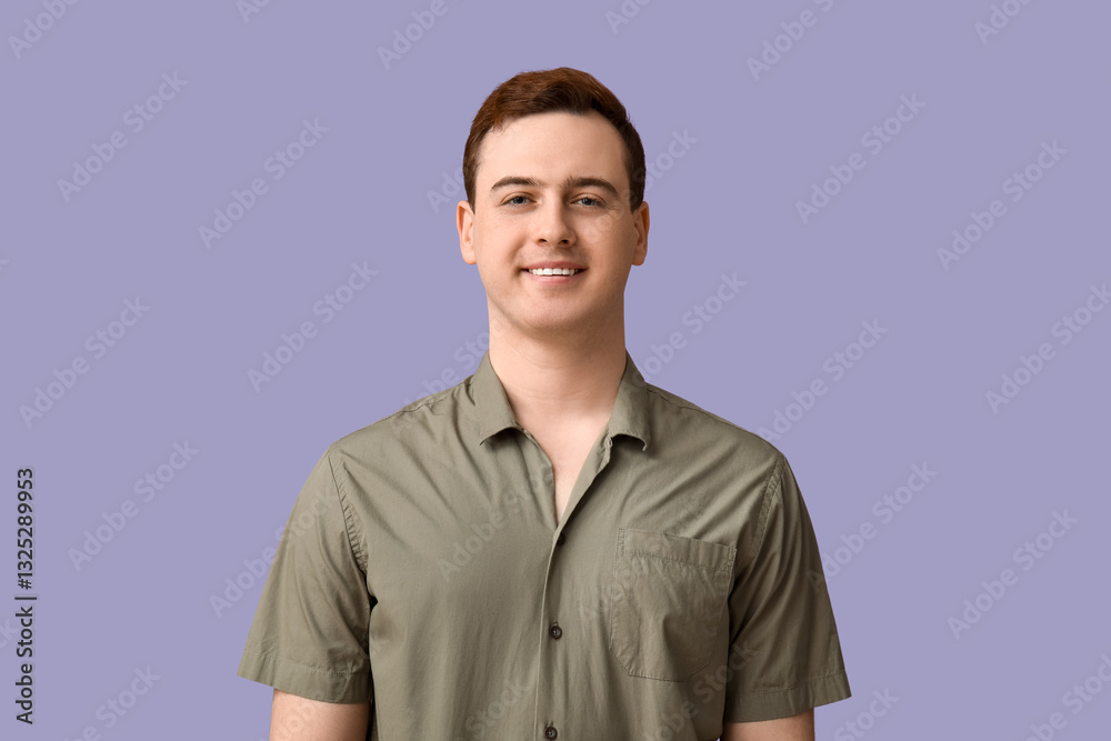 Handsome young man in stylish green collar shirt on lilac background Handsome young man in stylish green collar shirt on lilac background