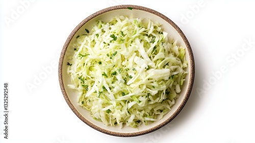 Grated fresh cabbage in a plate, top view on a white background, isolate