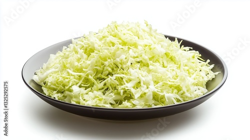 Grated fresh cabbage in a plate, top view on a white background, isolate