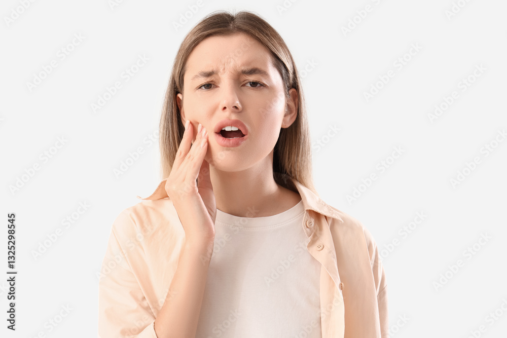 Pretty young woman suffering from tooth ache on white background Pretty young woman suffering from tooth ache on white background