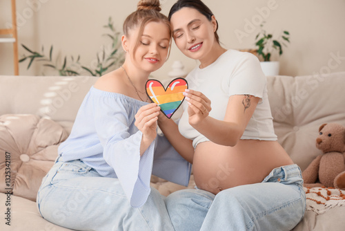 Young pregnant lesbian coup...