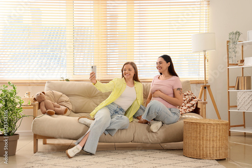 Young pregnant lesbian coup...