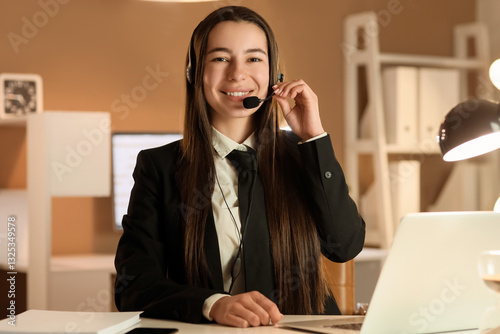 Young businesswoman with he...