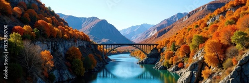 Clear blue sky above New River Gorge Bridge; autumn colors paint the canyon walls , stunning, aerial, view
