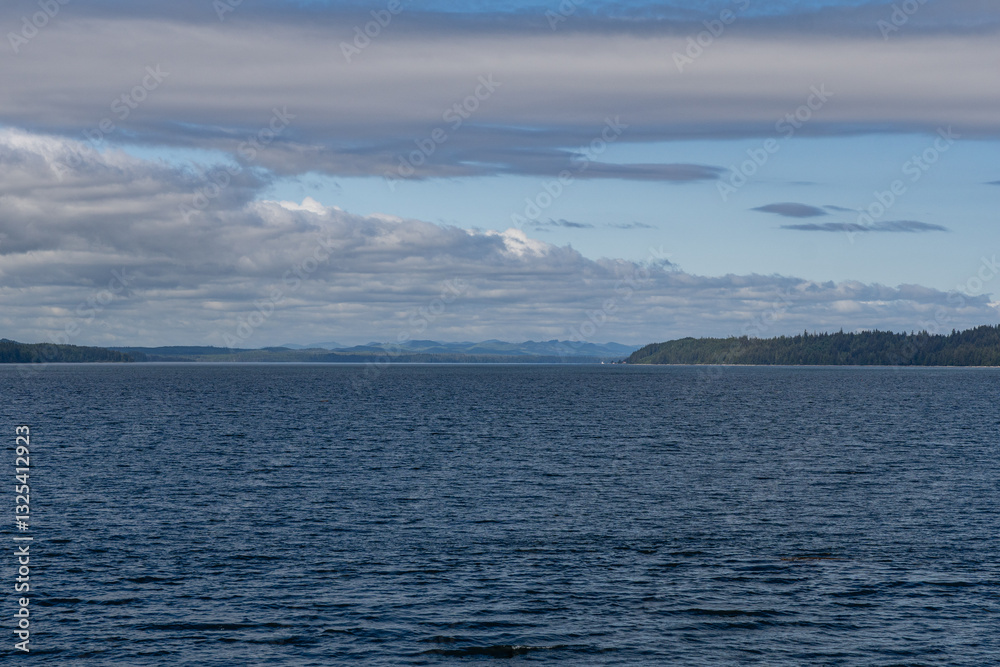 strait between islands north of Vancouver island the coast of the island view from Malcolm island strait between islands north of Vancouver island the coast of the island view from Malcolm island