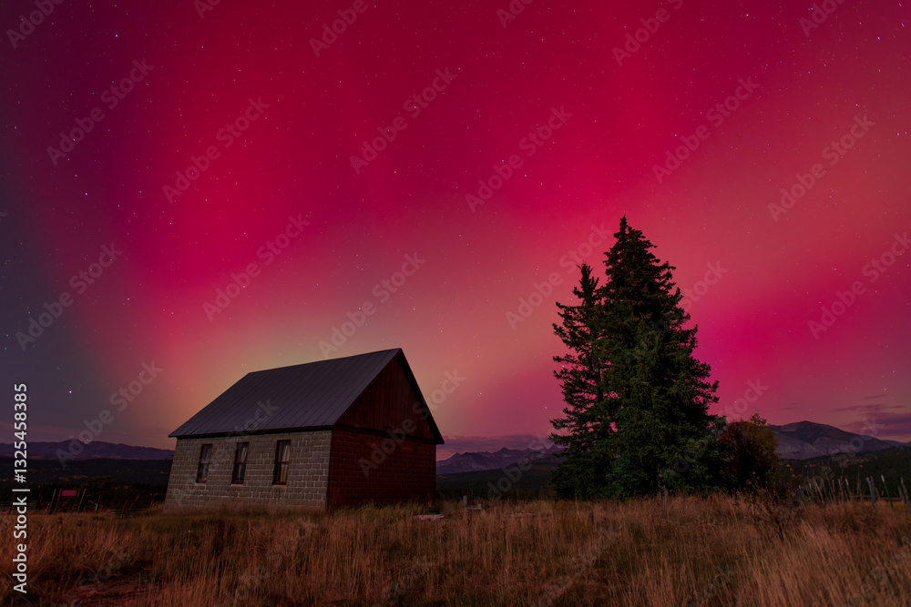 Aurora Borealis behind abandoned schoolhouse Aurora Borealis behind abandoned schoolhouse