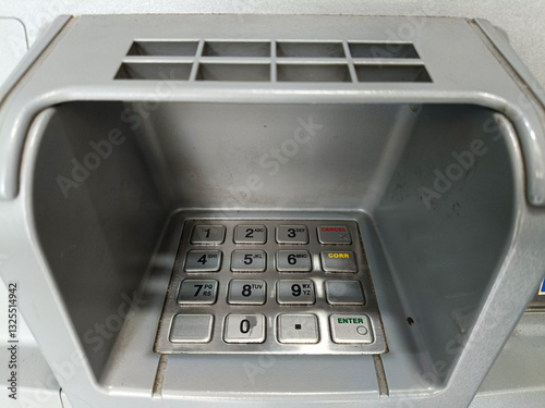 Closeup View of ATM Keypad Grey Plastic Housing, Metallic Number Pad