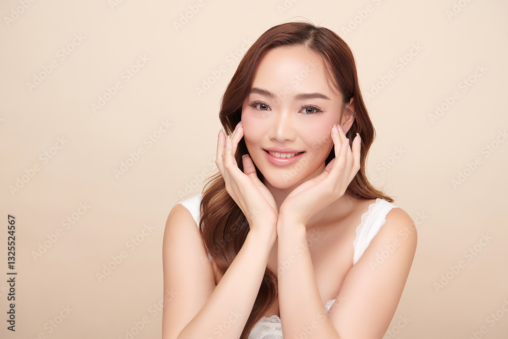 A beautiful young Asian woman with clean, fresh skin against a beige background. She represents beauty, skincare, and spa treatments. A beautiful young Asian woman with clean, fresh skin against a beige background. She represents beauty, skincare, and spa treatments.