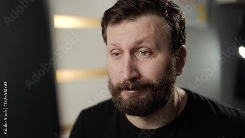 Burnout, vision problems, exhaustion concept. Tired man in glasses working on PC and rubbing tired eyes