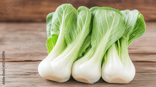 Fresh Bok Choy: a close-up of three vibrant heads of bok choy, set against a rustic wooden surface, showcasing the crisp freshness and natural textures of this nutritious vegetable.