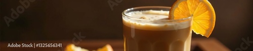 Creamy coffee beverage in a tall glass with a splash of orange juice, BeverageOnTable, LuxuryDrinks photo