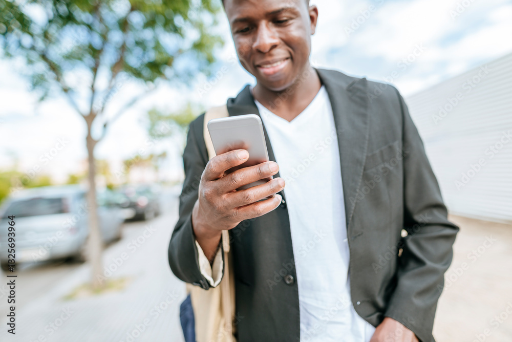Close up of businessman using smartphone on city street Close up of businessman using smartphone on city street