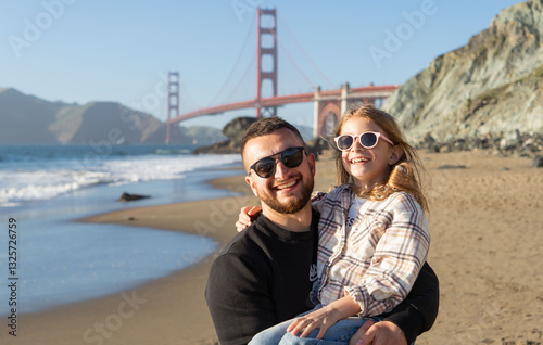 Photography Young father with daughter have fun at the beach, USA, California