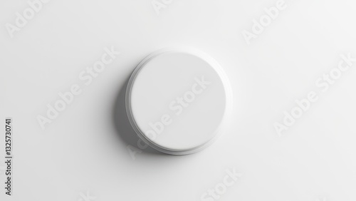 Obraz na płótnie A white plastic bottle top casting a shadow on a white background. w salonie