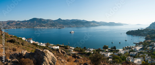 Fototapeta Naklejka Na Ścianę i Meble -  A panoramic summer view of Yalıkavak bay. Beautiful holiday resort on the Bodrum peninsula. Mugla province, Turkey country
