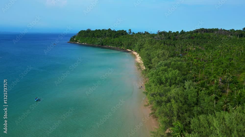 lonely beach with turquoise water and green forest in Koh Rong, Cambodia. Perfect aerial view flight descending drone lonely beach with turquoise water and green forest in Koh Rong, Cambodia. Perfect aerial view flight descending drone
