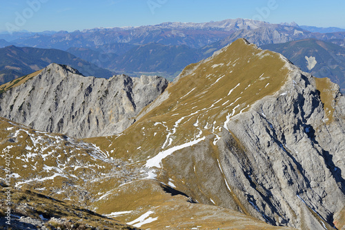 Beautiful sunny fall landscape under blue sky from summit of mountain Kalbling, Admont, Styria, Austria