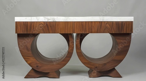 Contemporary freestanding bathroom vanity with a marble top.