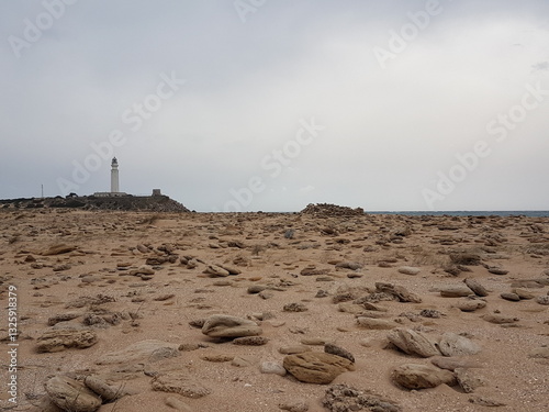 Obraz na płótnie Lighthouse Trafalgar, Andalucia.
Loneliness at the beach of the cape of Trafalgar with a calm surrounding looking like a desert. w salonie