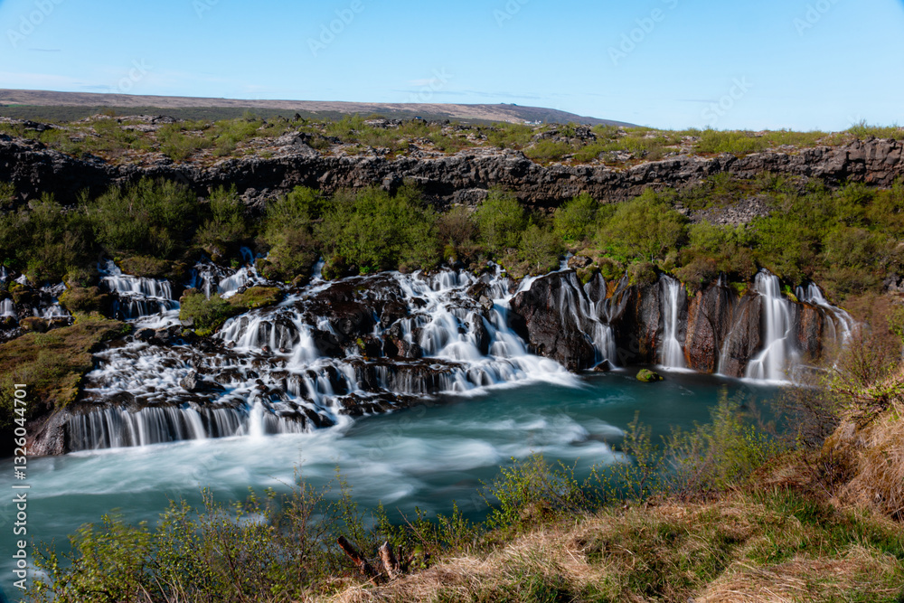 Fototapeta premium long exposure shot of wide Hraunfossar waterfall, Iceland