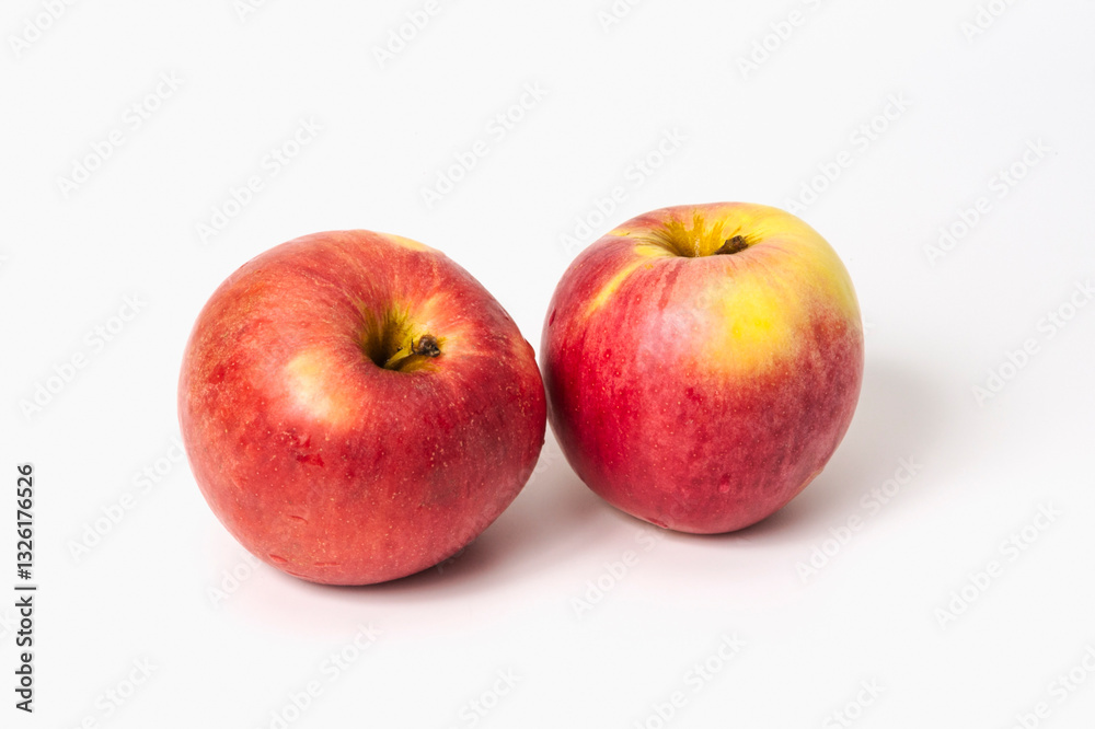 Two ripe red apples on a white background. Isolated Two ripe red apples on a white background. Isolated