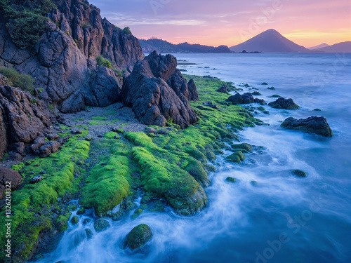 seascape at sunset with dramatic rock