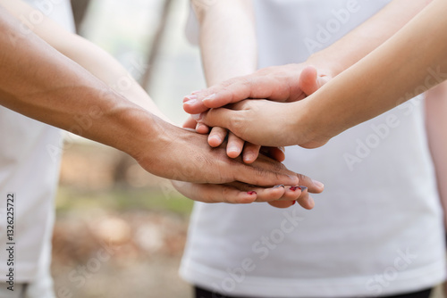 Teamwork in Action. Volunteers joining hands for a common cause.