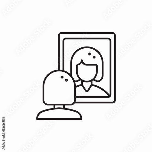 a woman looks at herself in the mirror icon vector sign