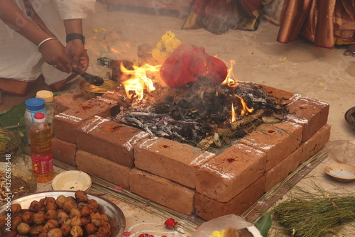 sacred fire agni performance or yagna, religious performance in hinduism 