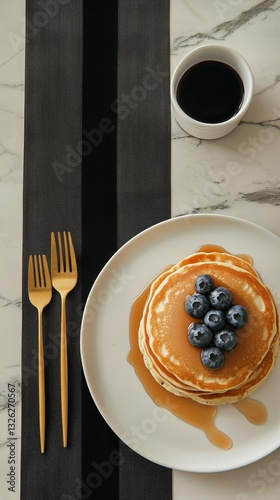 Delicious Pancakes With Fresh Blueberries and Syrup for Breakfast on a Marble...