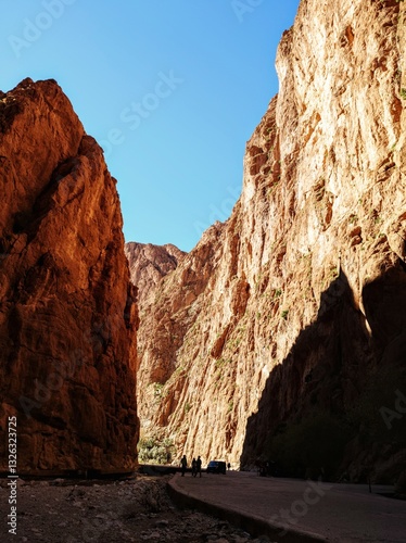 Obraz na płótnie Scenic mountain gorge with steep rocky cliffs under a clear blue sky in Todra Gorge, Morocco w salonie