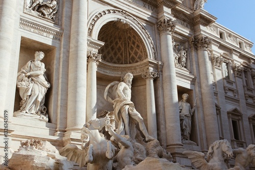 Close-Up of Trevi Fountain Baroque Sculptures in Rome, Italy with Dramatic Shadows Cast by the Afternoon Sun