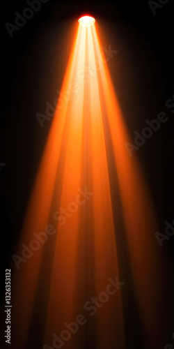 Brilliant orange spotlight illuminating darkness with dramatic effect