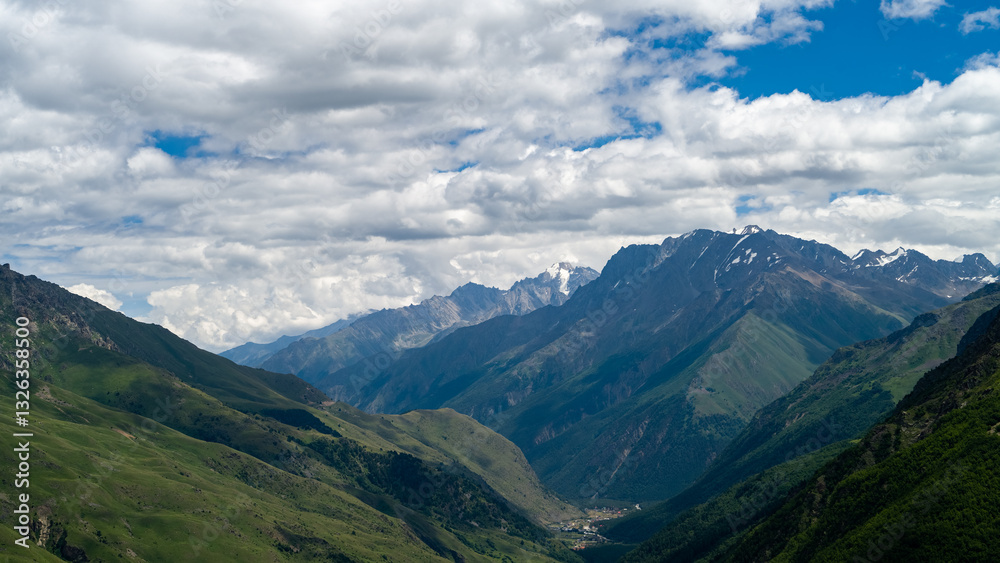 rocky mountain peaks in the clouds. cloud cover in the mountains rocky mountain peaks in the clouds. cloud cover in the mountains