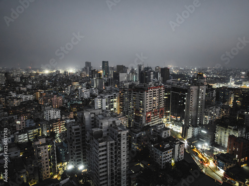 Wallpaper Mural Aerial view of bustling downtown skyline with modern skyscrapers and vibrant city lights at night, Paltan Thana, Dhaka, Bangladesh. Torontodigital.ca