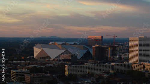 Atlanta, United States - 17 November 2024: Aerial view of mercedes-benz stadium and vibrant skyline at dusk, downtown, atlanta, georgia, united states.