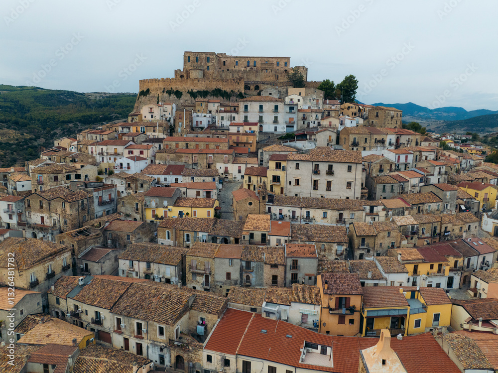 Aerial view of the medieval old town with historic stone buildings and a fort, Rocca Imperiale, Cosenza, Italy. Aerial view of the medieval old town with historic stone buildings and a fort, Rocca Imperiale, Cosenza, Italy.