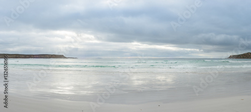 Panorama of bay sheltered by headlands