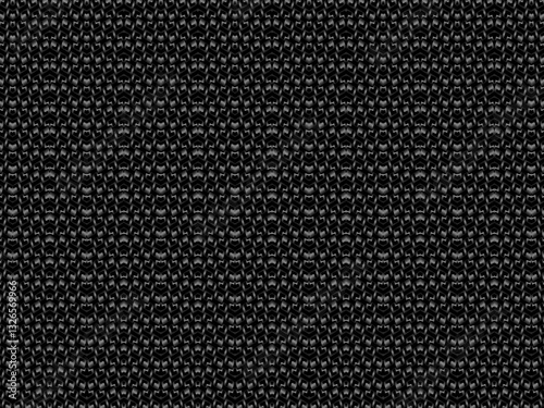 Black metal texture steel background. Perforated metal sheet. Texture of black carbon fiber.