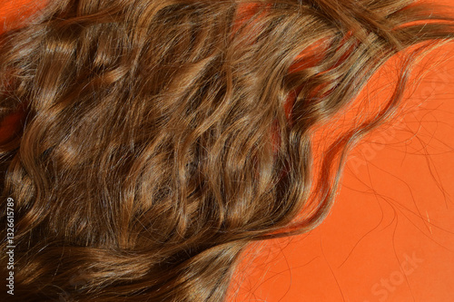 natural, long female hair, grooming, combing hair, hairstyle of a man, a girl. background for the design.