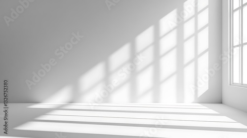 Minimal light gray background with soft shadows and window light