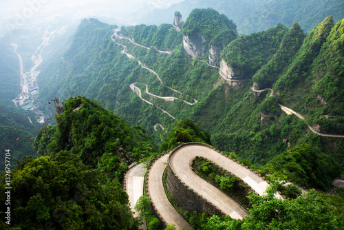 View landscape range mountain and road 99 curve turn for chinese people travelers travel visit Tianmen Shan cave Heaven Gate in Tianmenshan Mountain National Forest Park at Zhangjiajie in Hunan, China