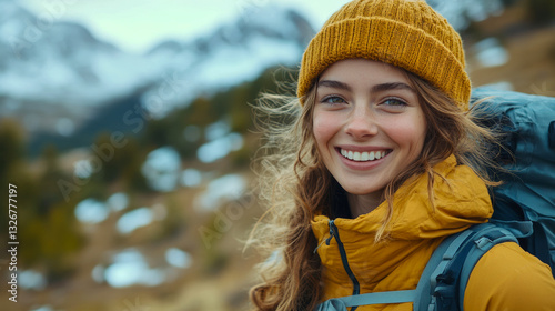 Happy young woman hiking in the mountains smiling backpacker adventure travel.