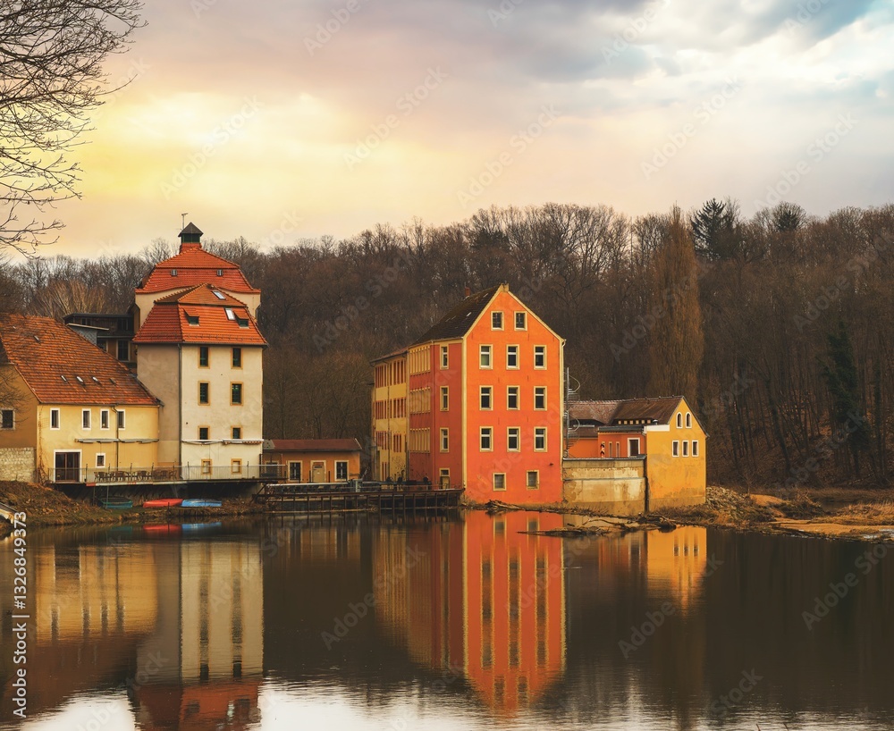 Houses reflection on the Neisse at dusk